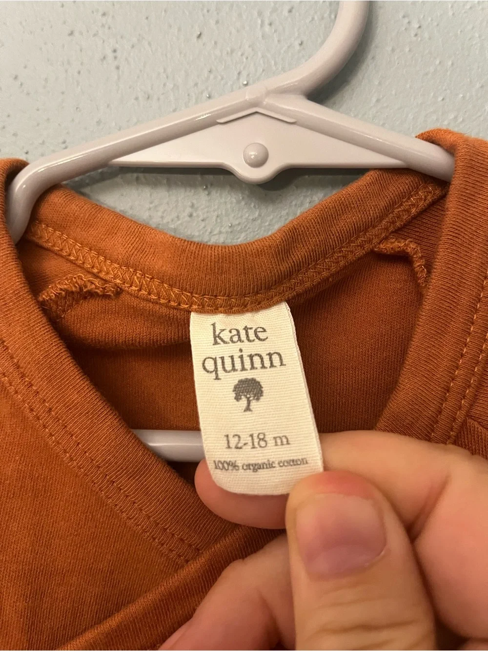 Kate Quinn Wrap-Front Long-Sleeve Onesie
